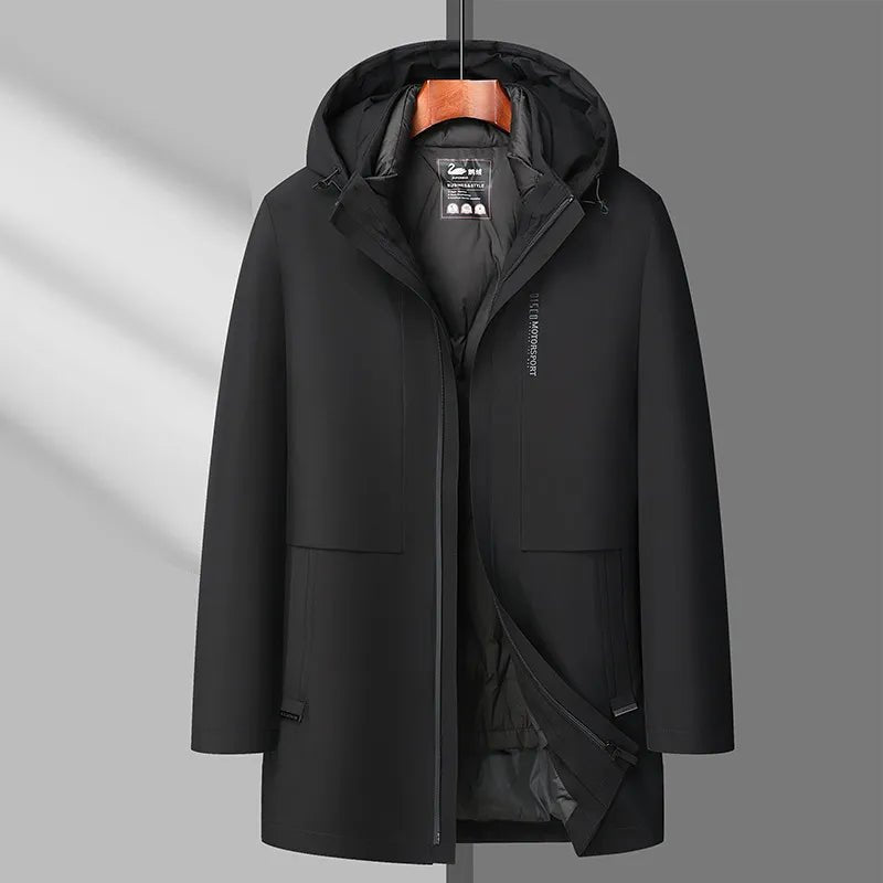 Black coat on a hanger against a gray background